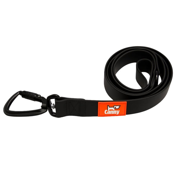 Black waterproof and odourless dog lead coiled neatly, with orange logo tag and black locking carabiner clip.