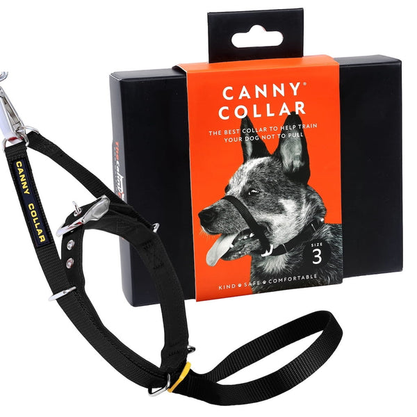 Black Canny Collar head collar in retail packaging with the wording 'The best collar to help train your dog not to pull'.