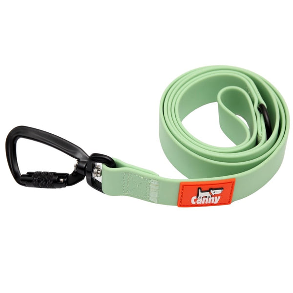 Mint green waterproof and odourless dog lead rolled up, featuring orange brand patch and black swivel carabiner.